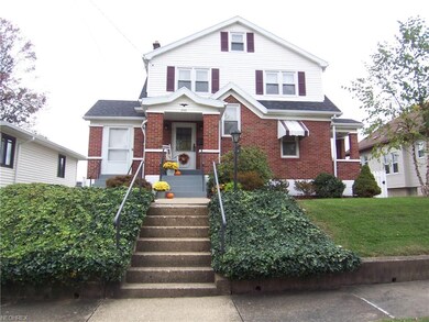 Brick and vinyl low maintenance.