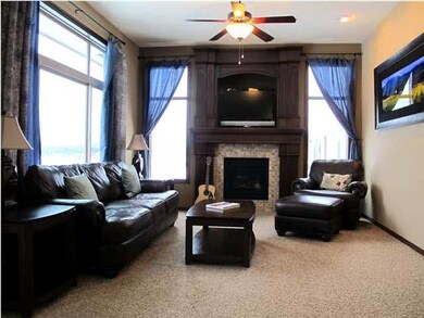 Living Room with large picture windows, built-in t