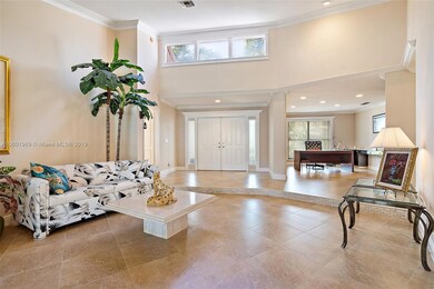 Entry, Living Room & Den/Office