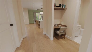 Hallway featuring recessed lighting, light wood-ty