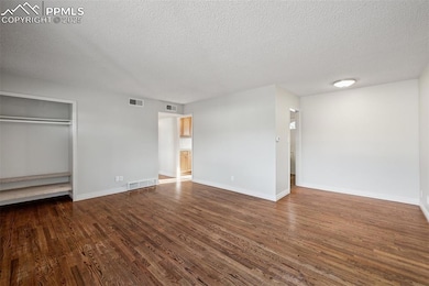 Living room featuring original hardwood floors, fr