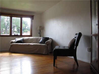 Living Room. The living room, features bay window 