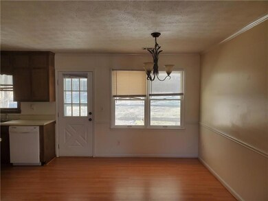 Unfurnished dining area with plenty of natural lig