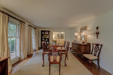Living Room  with crown molding, plenty of natural
