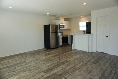 LIVING ROOM AND KITCHEN