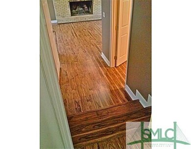 Den/Family/Great Room. Step down to third bedroom,