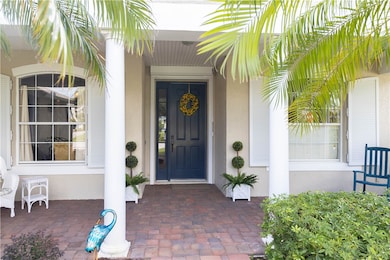 Property entrance with stucco siding
