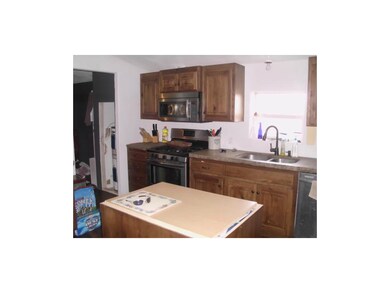 Stainless steel appliances, custom cabinets