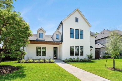 Two-story home with a striking crisp white exterio
