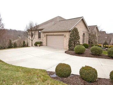 Exterior Front. Level driveway and large garage op