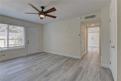 Large living area with access to patio