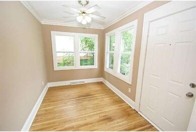 Open the door to a beautifully, bright sunroom.