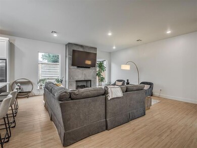 Doorway with wood finished floors and stairs
