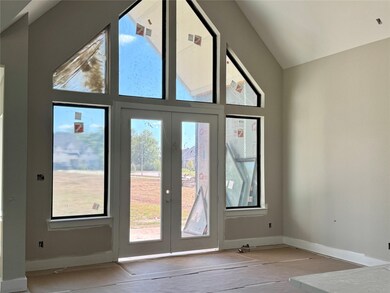Breakfast with French Door leading out to covered patio