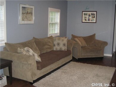Living Room. Bright  living room with wood stove.