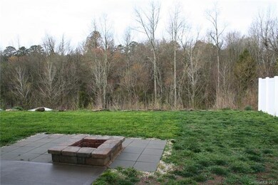 Rear yard and fire pit over look a gorgeous adjoin