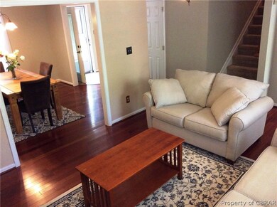 Beautiful cherry floors throughout the living room