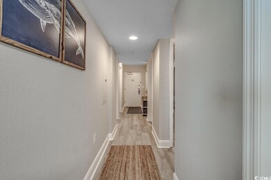Corridor featuring light hardwood / wood-style flo