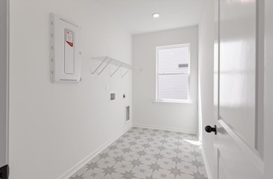 laundry room with window
