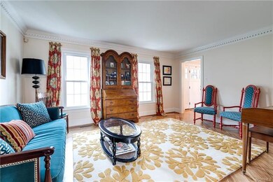 Alternate view of the formal living room.