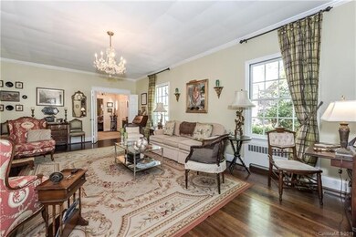 formal living room with fireplace