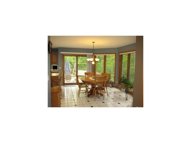 Kitchen. Large eat in area in the kitchen with bay