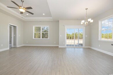 Unfurnished room featuring hardwood / wood-style f