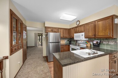 7024 Gardenview Ct SW, Byron Center, MI 49315 - photo 4