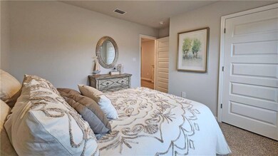 Bedroom with visible vents