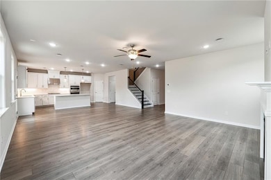 Unfurnished living room featuring recessed lightin