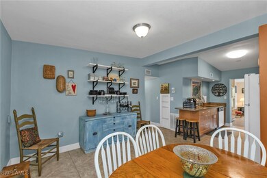 Dining area featuring baseboards, visible vents, a