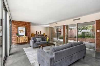 Living Room to Dining space showing sliding doors