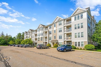 Wellington Crossing unit 407, Waltham, MA 02452 - photo 2