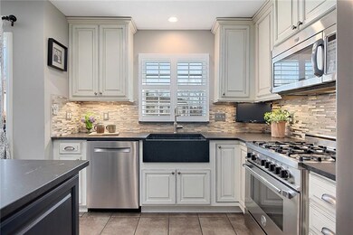 Kitchen renovations included a farmhouse sink, upg