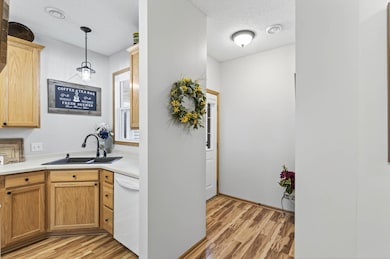 You’ll love the gorgeous engineered hardwood that spans the entire entry, bath, kitchen and dining room.