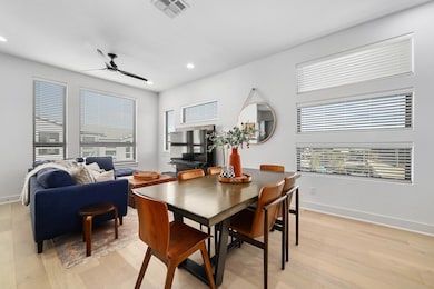 Dining area featuring light wood finished floors,