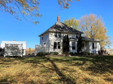 Relaxing brick paved Patio is inside the fencing on the left side of the Home