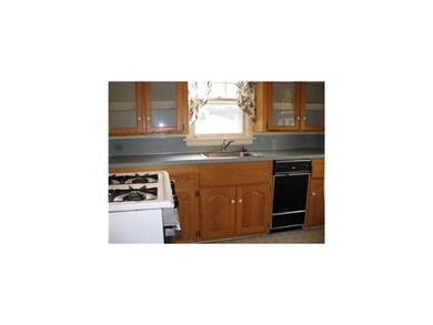 Kitchen. Newer oak cabinets in kitchen.  Appliance