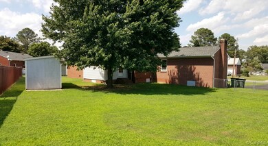 Fenced Back Yard great for family, pets & entertaining.  Detached Shed.
