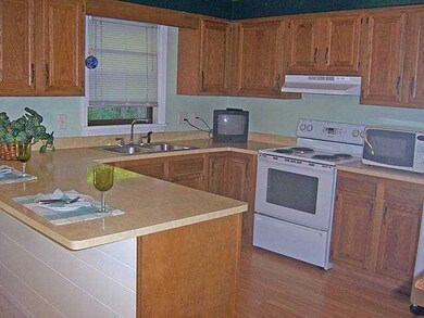 Kitchen. Raised panel oak cabinets in the kitchen.
