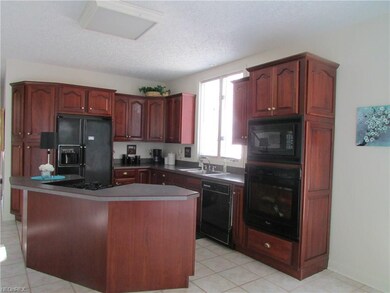 Cherry Cabinets & Ceramic Floor