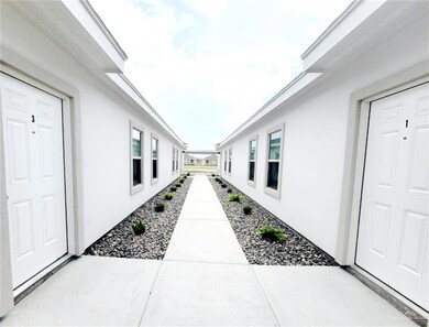 View of front of house with covered parking