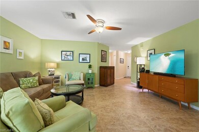 Living room angle toward entryway