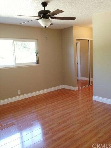 Master bedroom with view towards the back yard