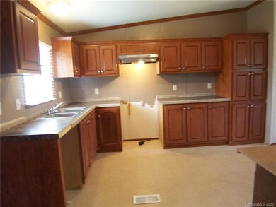 Kitchen has lots of cabinets and counter top space