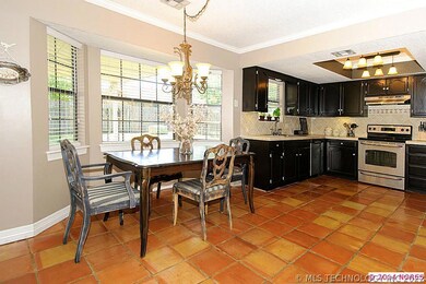 LARGE DINING AREA WITH BAY WINDOW OFFERING VIEWS O