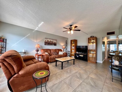 303 Wellington C, West Palm Beach, FL 33417 - photo 4