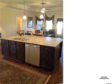 Great for entertaining! Island overlooks family room