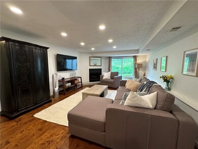 View of living room as you enter from the kitchen,