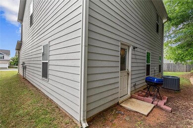 View of property exterior with central AC